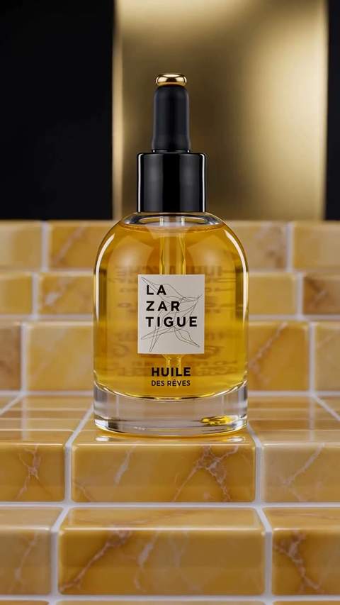 A serum bottle on gold tiles: the Liquid gold video template
